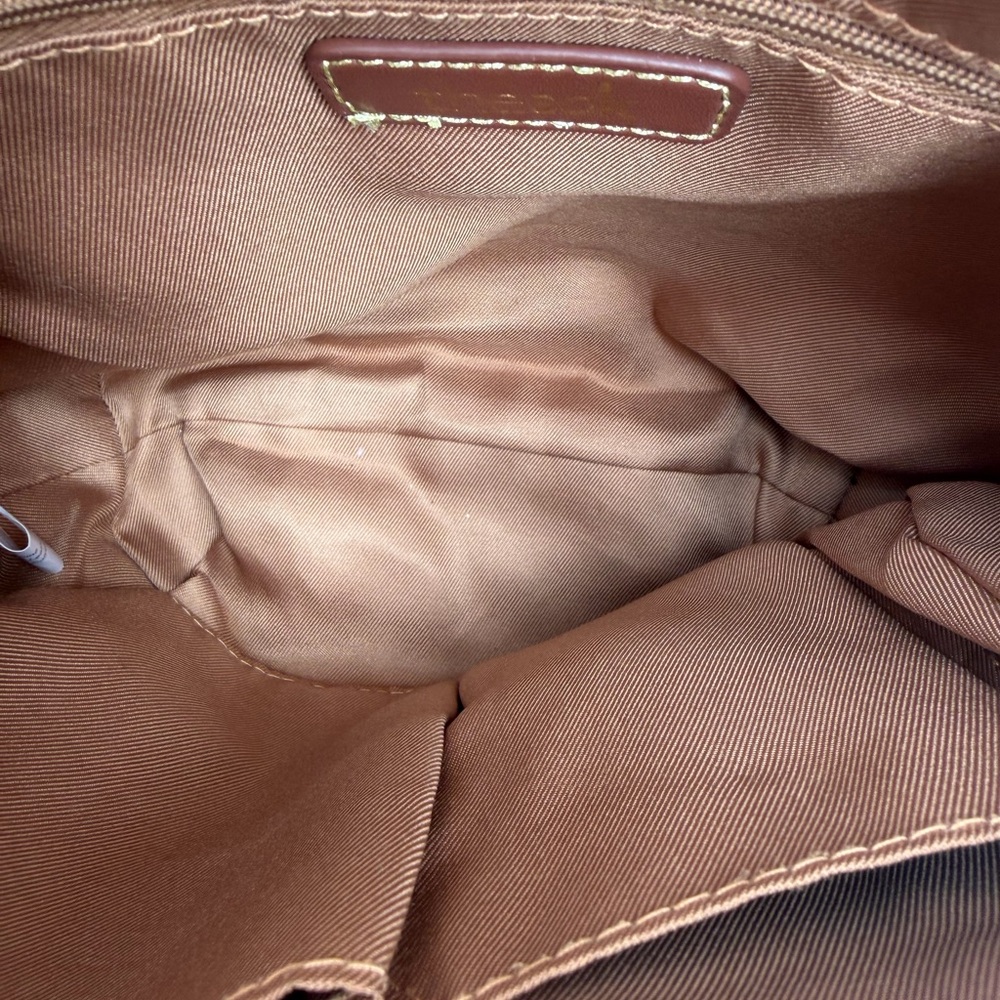 The Sak Silverlake Crossbody Bag in the Tobacco Floral Emboss color. - Picture 3 of 5